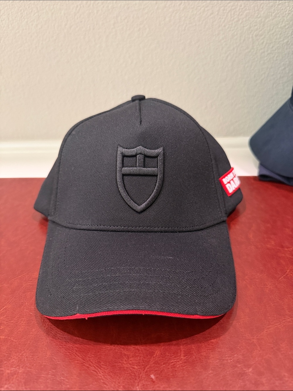 Tudor Black Hat with Red Trim
